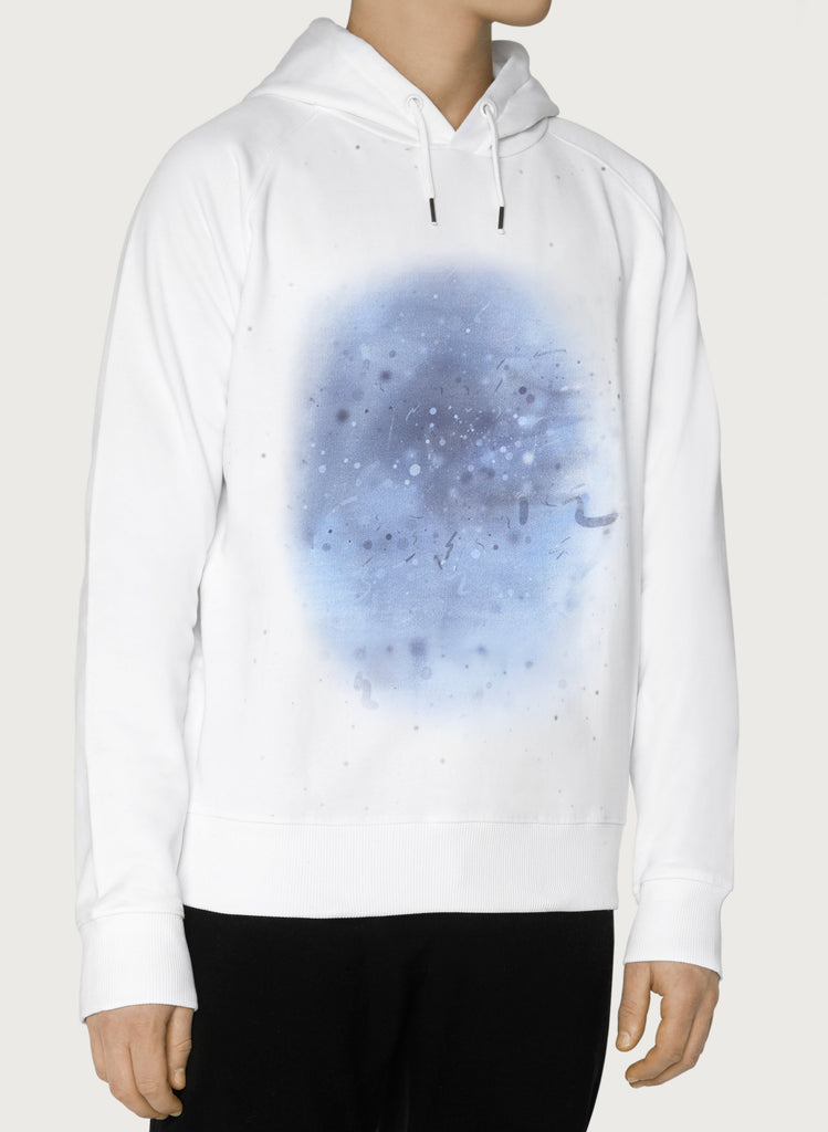 Male model wearing white sweatshirts with blue, artistic design. Wearable art, unisex hoodie for him and her. Front view.