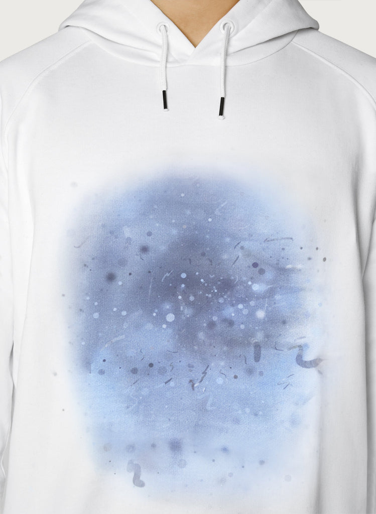 Male model with white sweatshirts on. The hoodie has blue, artistic design. Wearable art, unisex hoodie for him and her. Front design.